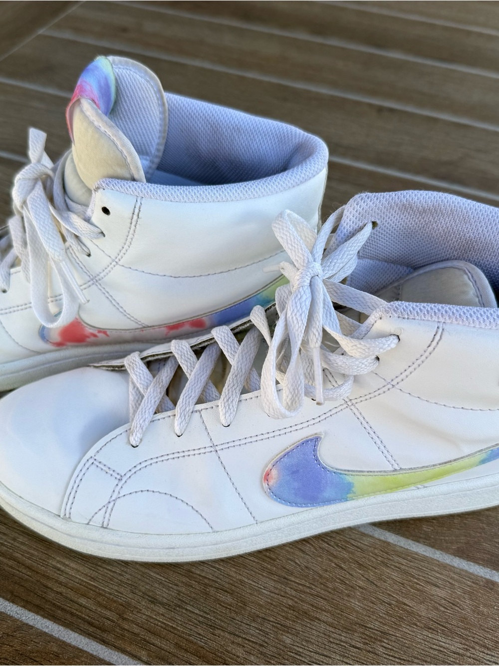 Nike White High-Top Sneakers with Pastel Rainbow Swoosh